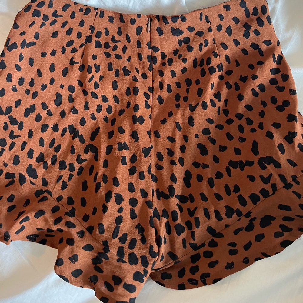 Brown and black leopard print shorts 🐆